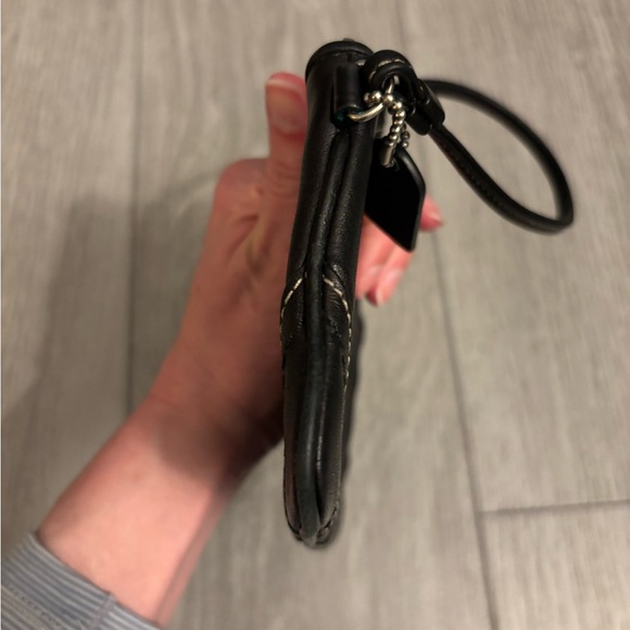 Coach wristlet in black leather. Hangtag present. EUC. - Picture 6 of 11